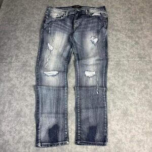 WT02 Distressed Blue Jeans Size 38x32
